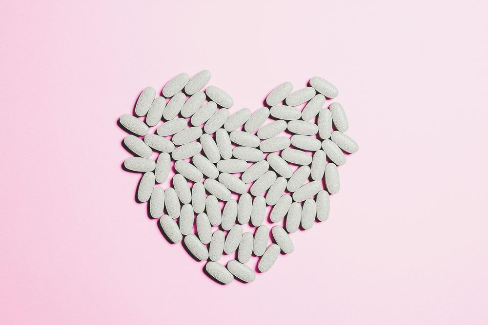 A stethoscope resting on a white surface symbolizing clinical heart health monitoring.