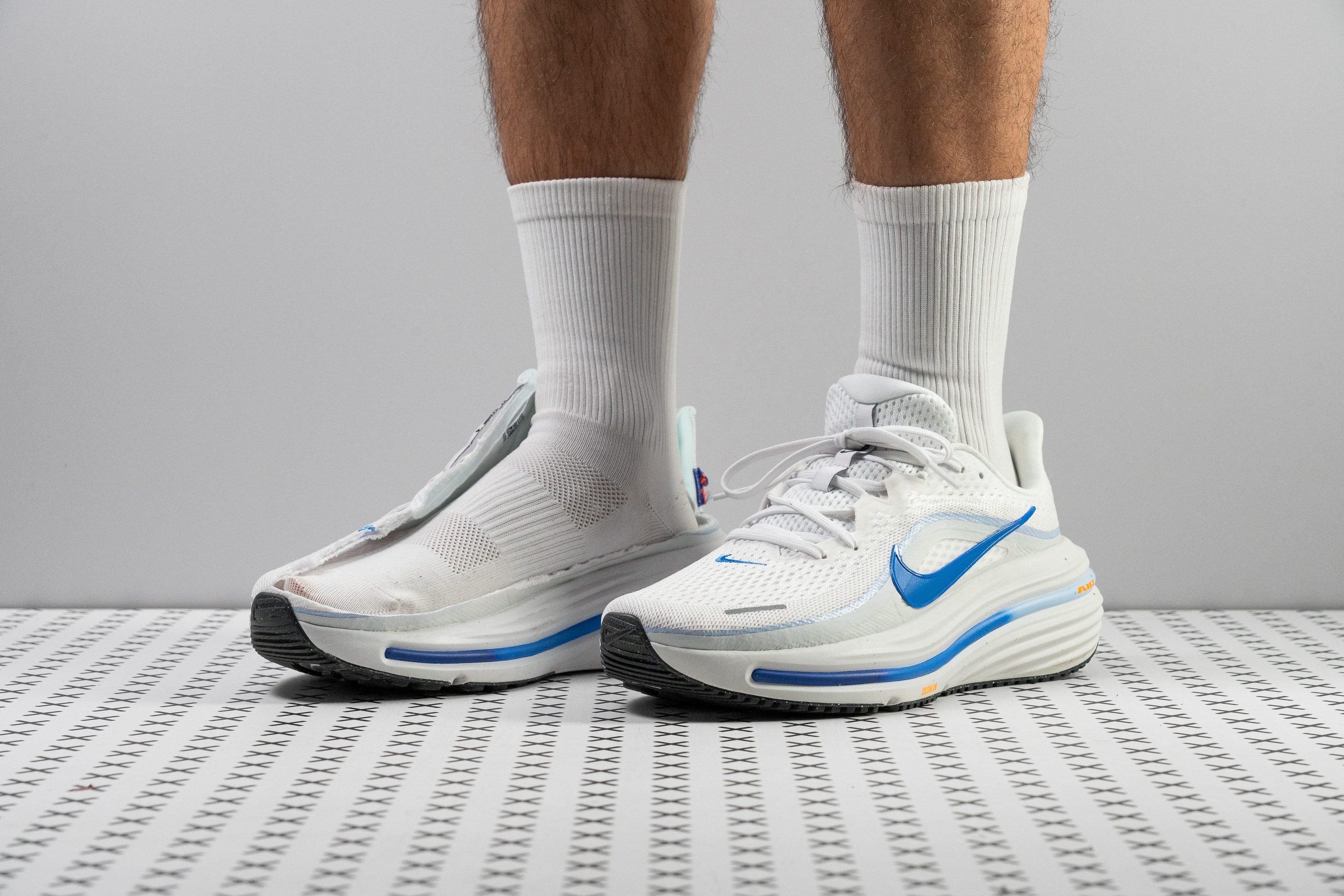 Side profile of a Nike Winflo 12 running shoe, highlighting its cushioned midsole.