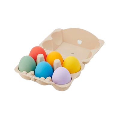 A set of rainbow-colored silicone sensory egg toys.
