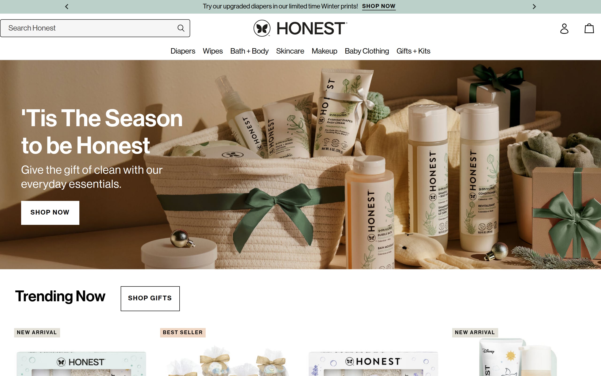 A flat lay of Honest Beauty clean skincare products including cleansers and moisturizers.
