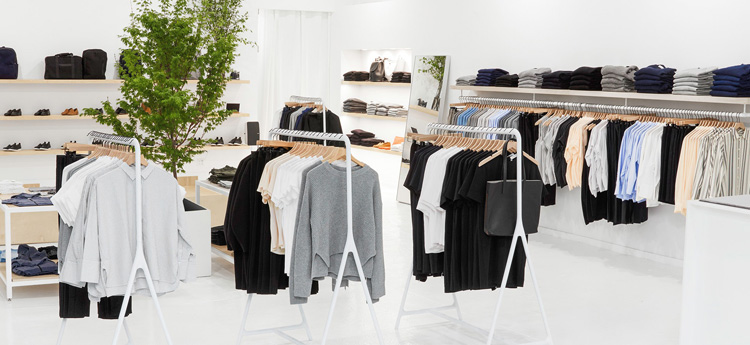 Sustainable and ethical men's fashion items displayed in a lifestyle setting.