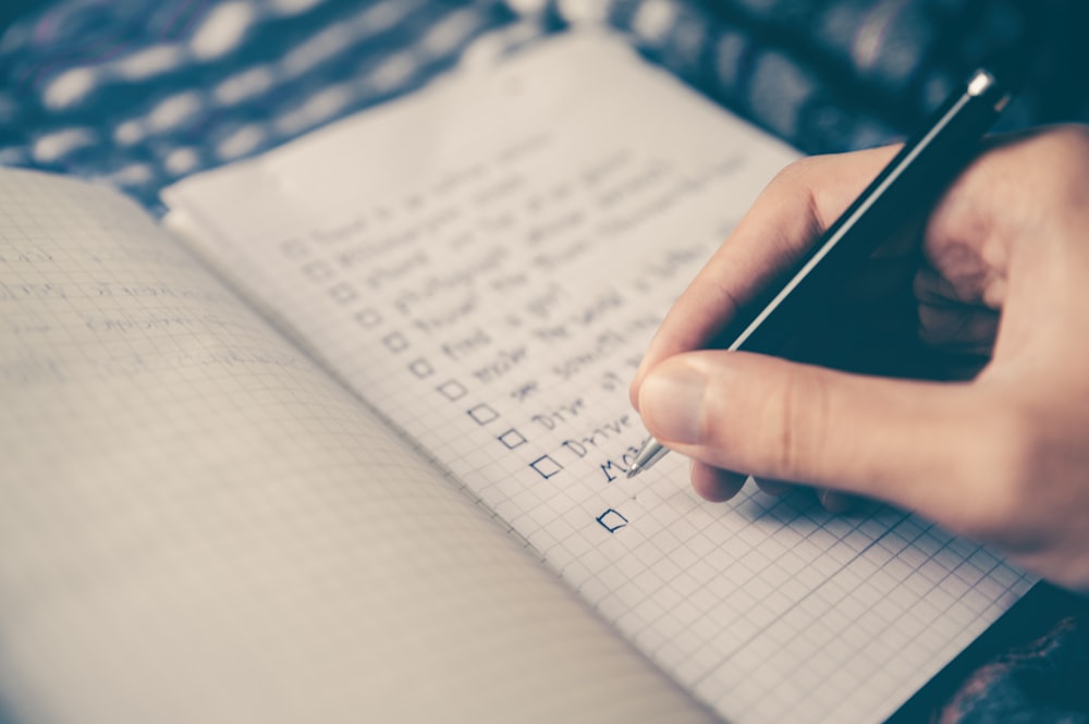 A medical clipboard with a screening checklist used to evaluate psoriatic arthritis symptoms.