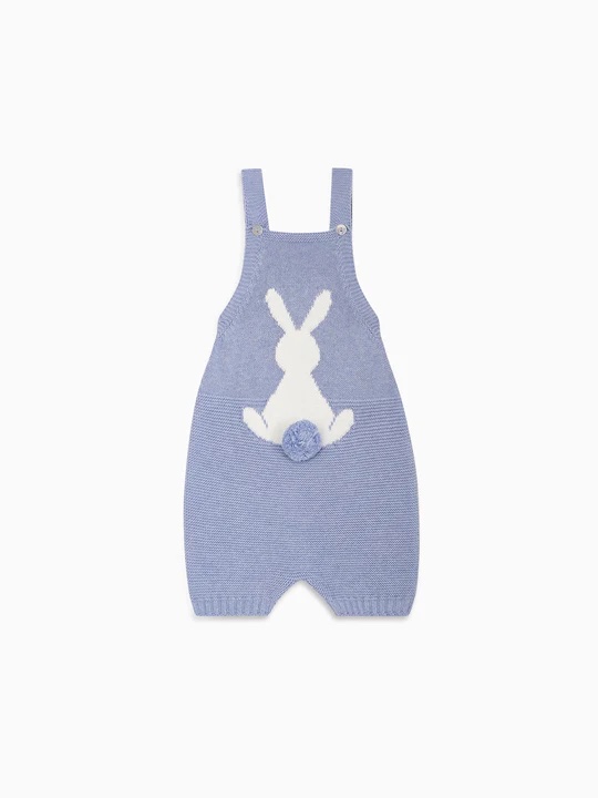 Blue knit cotton dungarees for children with intricate stitch details.