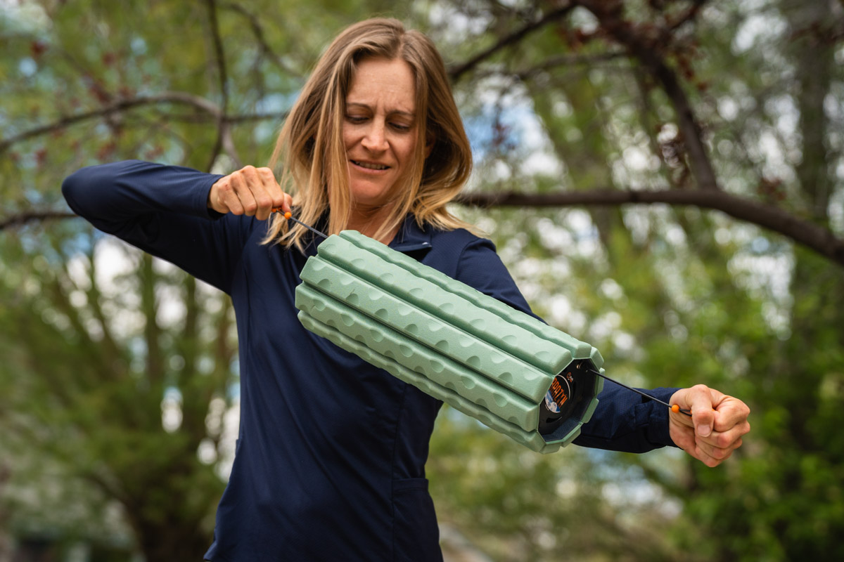 The Brazyn Life Morph Collapsible Foam Roller shown in its open and flat portable states.