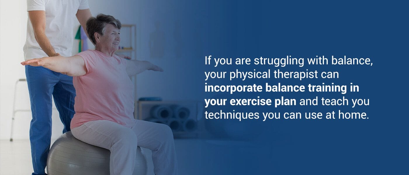 Elderly woman performing balance training on an exercise ball with a therapist's support