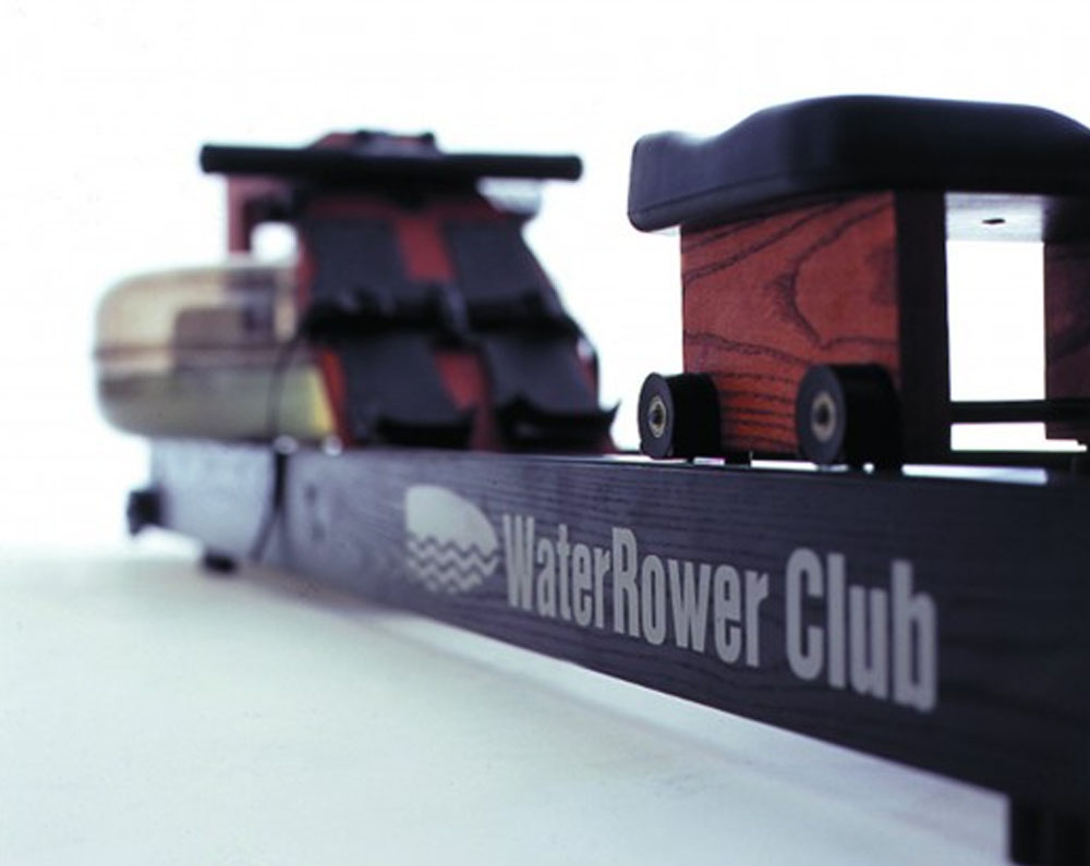 Close-up detail of the clear water resistance tank and internal paddles of a WaterRower.