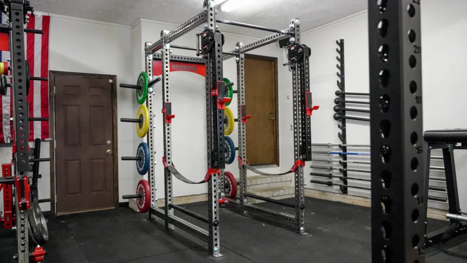 The Fitness Reality 810XLT Super Max Power Cage setup in a home gym.