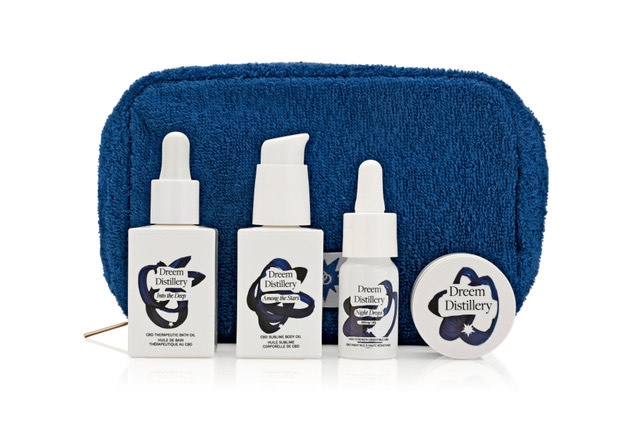 Dreem Distillery Jet Set Kit in a luxury blue towelling wash bag.