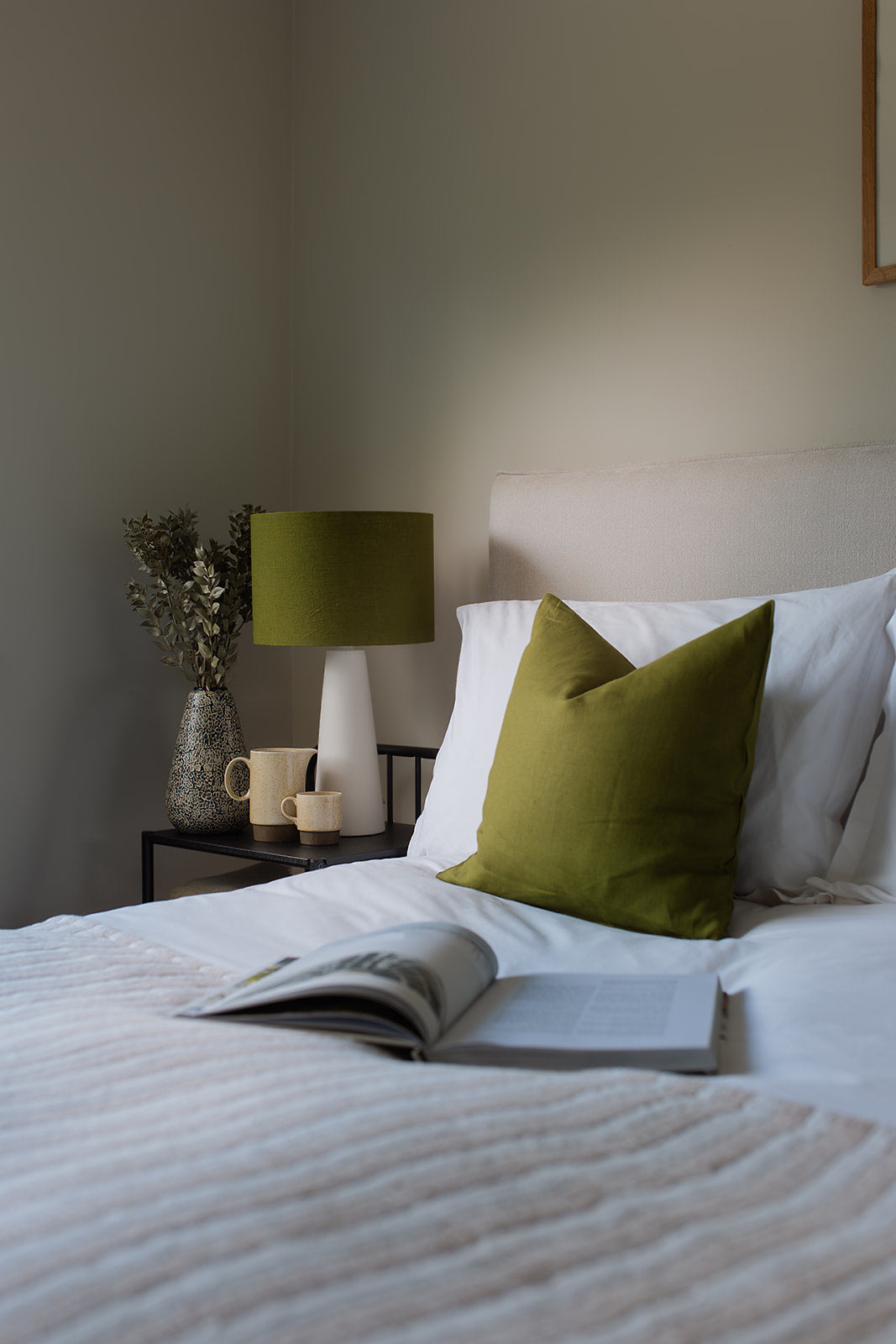 A person engaging in quiet, restorative self-care activities in a serene home setting.