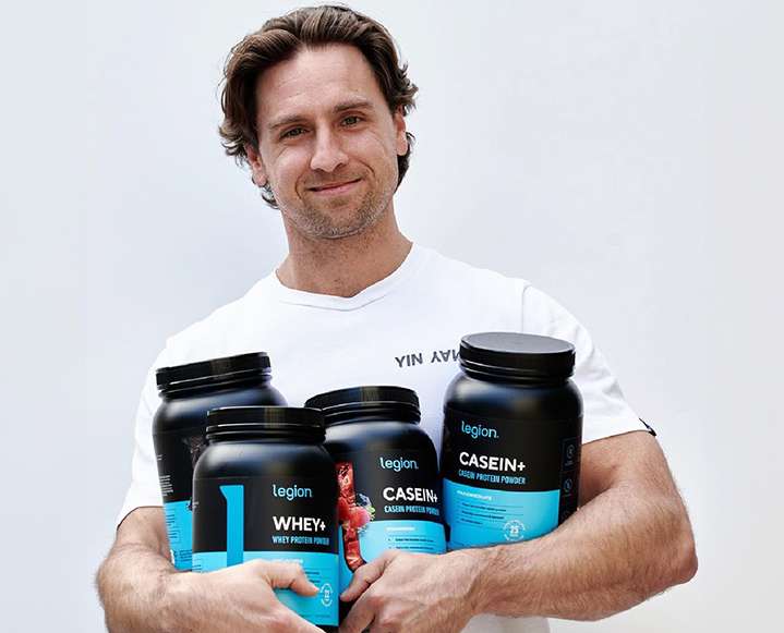 A collection of Legion Athletics supplement containers including pre-workout and post-workout stacks.