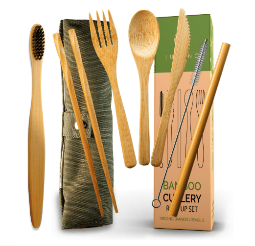 Reusable bamboo cutlery set with a travel wrap including a fork, spoon, and straw.
