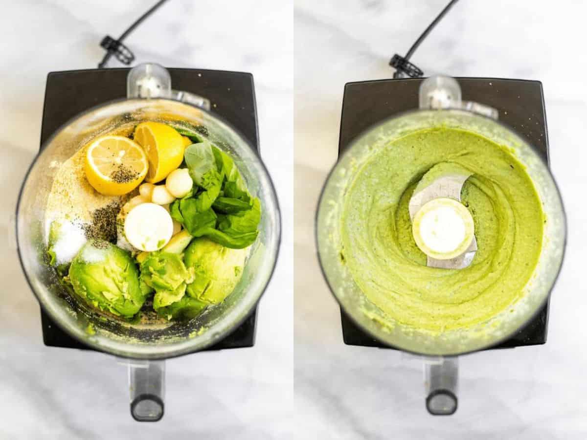 Close-up of fresh basil, avocado, and cashews inside a food processor before blending.