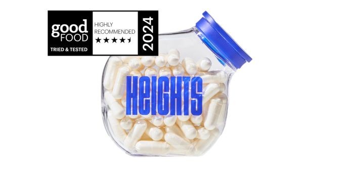 Heights Magnesium+ capsules in a uniquely shaped clear glass bottle.