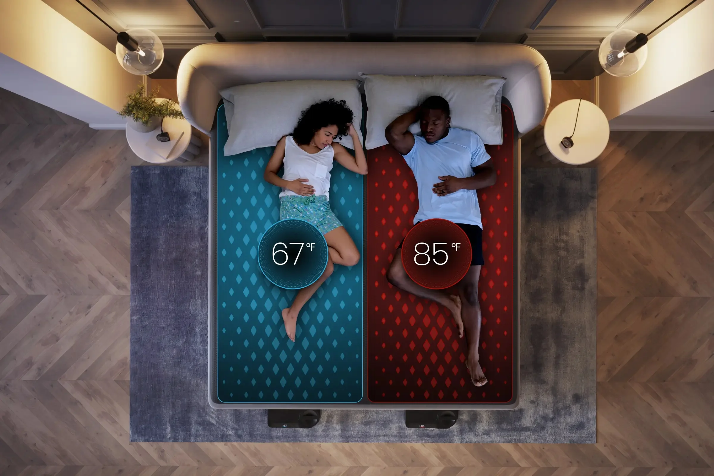 A couple resting on a mattress featuring a dual-zone cooling system with visible temperature controls.